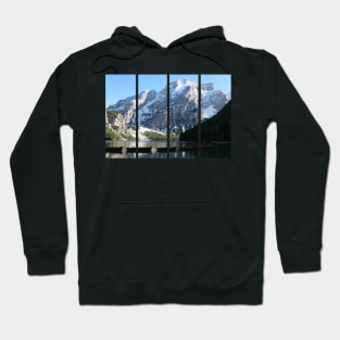 The fabulous alpine lake of Braies in the Dolomites (Bolzano). Lovely place in the Italian Alps. Boats on the water. Reflections in the water. Sunny spring day. Trentino Alto Adige Hoodie